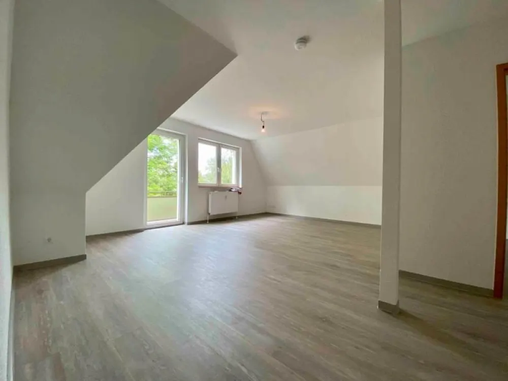 Besondere 2-Zimmer Dachgeschosswohnung mit Ausblick ins Grüne