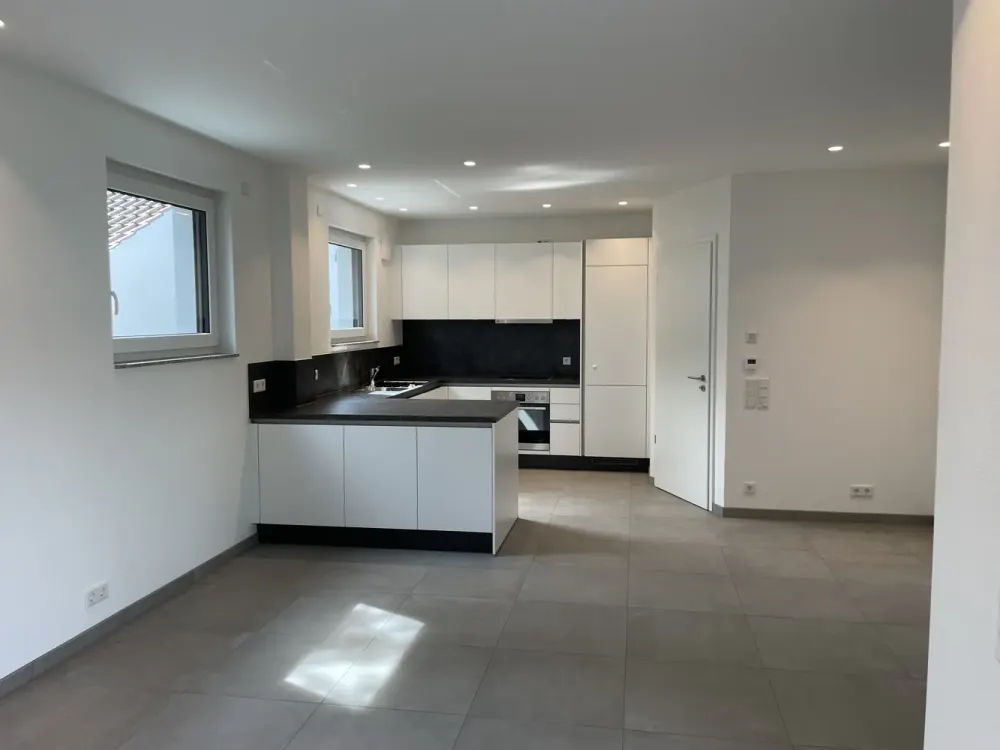 Neubau! Hochwertige EG-Wohnung mit Garten & Stellplatz
