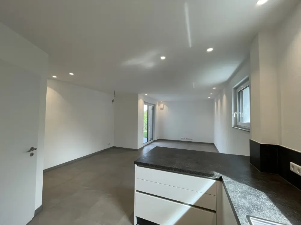Neubau! Hochwertige EG-Wohnung mit Garten & Stellplatz