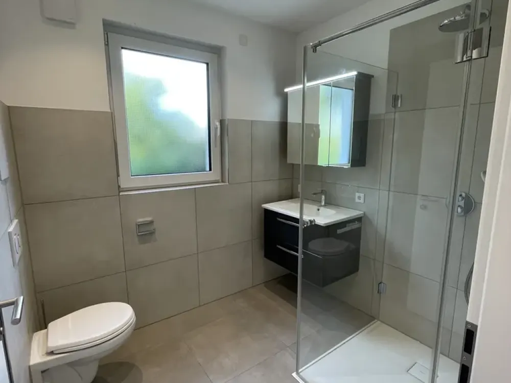 Neubau! Hochwertige EG-Wohnung mit Garten & Stellplatz