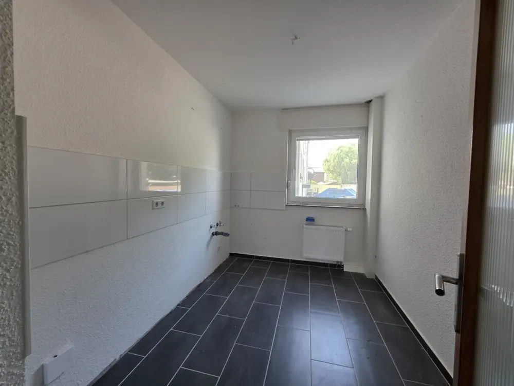 Renoviert und Erdgeschoss! 2 Zimmerwohnung mit Balkon, energieeffizient zentral in Datteln