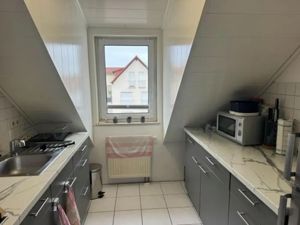 2 Zimmer Dachgeschosswohnung mit Balkon und Stellplatz in Rheinzabern
