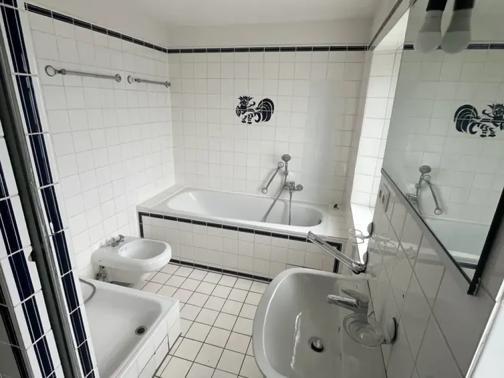 Wohnen mit Geschichte, außergewöhnliche Maisonettewohnung im historischen Frohnhof Worringen