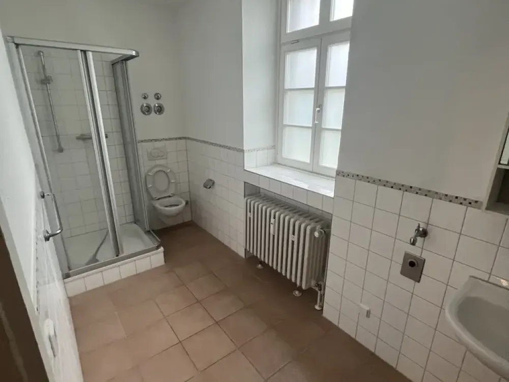 Wohnen mit Geschichte, außergewöhnliche Maisonettewohnung im historischen Frohnhof Worringen