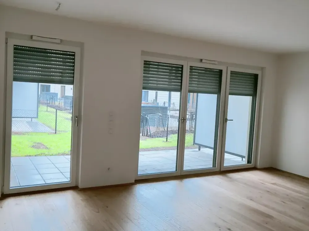3-Zimmer-Wohnung mit privaten Terrasse u. Garten sowie Designer-Einbauküche