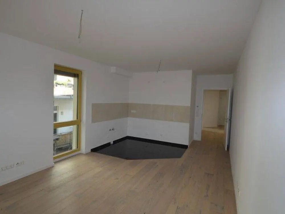 HOFGEBÄUDE - Neubau im Zentrum-Süd! 2-Zimmerwohnung im EG mit Terrasse und Garten