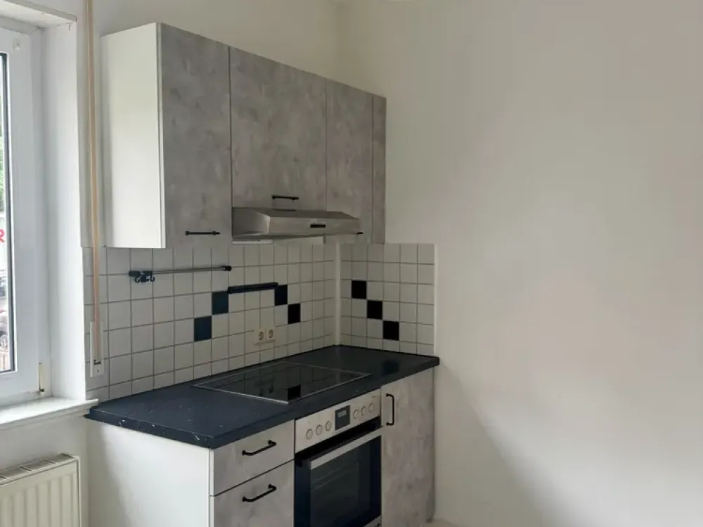 gepflegte 1-Zimmer-Erdgeschosswohnung mit kompletter EBK