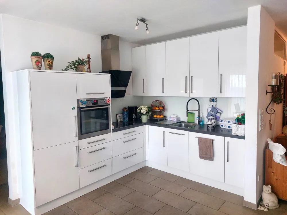 3-Zimmer-Erdgeschosswohnung mit Garten & Tiefgaragenstellplatz
