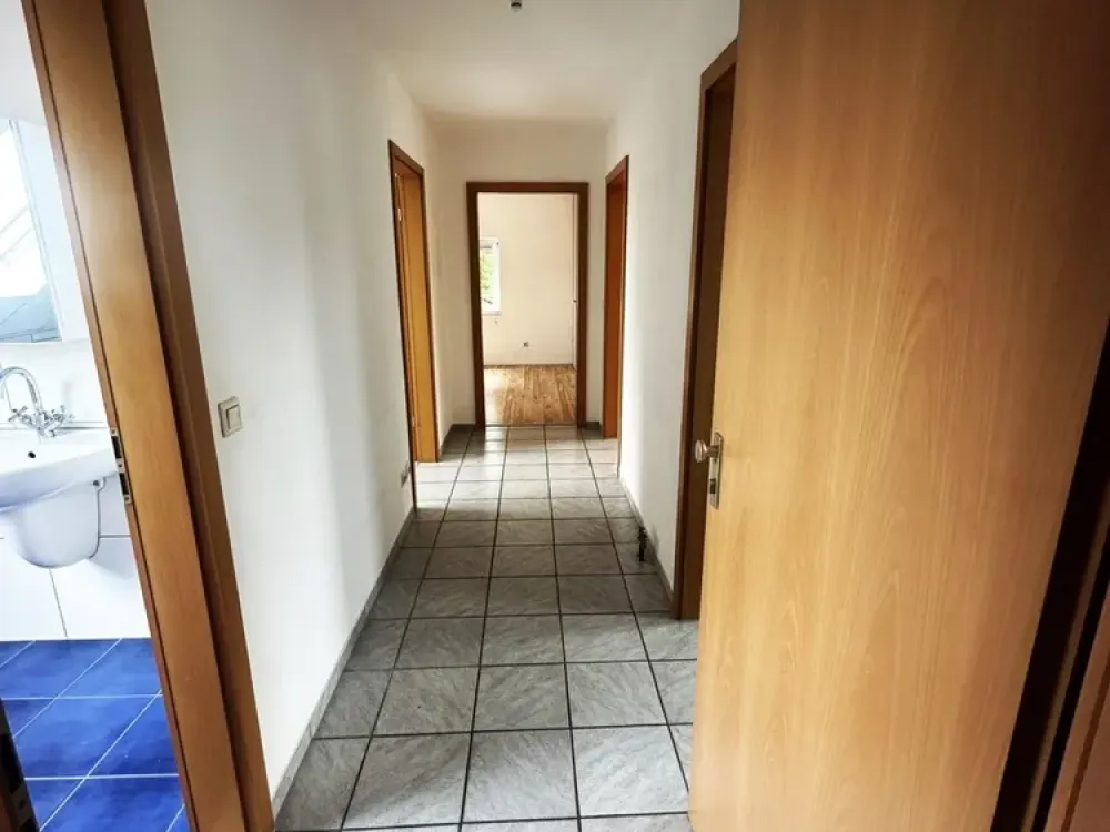 Dachgeschosswohnung in ruhiger Lage an der Haard. Inklusive Garage und Keller.