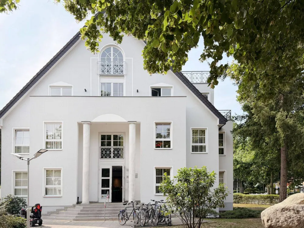 Außergewöhnliche Dachgeschosswohnung mit Wellnessbereich und Kamin