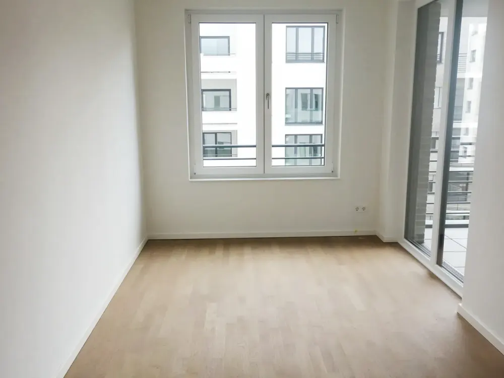 Beautiful, spacious, like-new 4-room apartment with balcony, fitted kitchen and underground parking in Düsseldorf