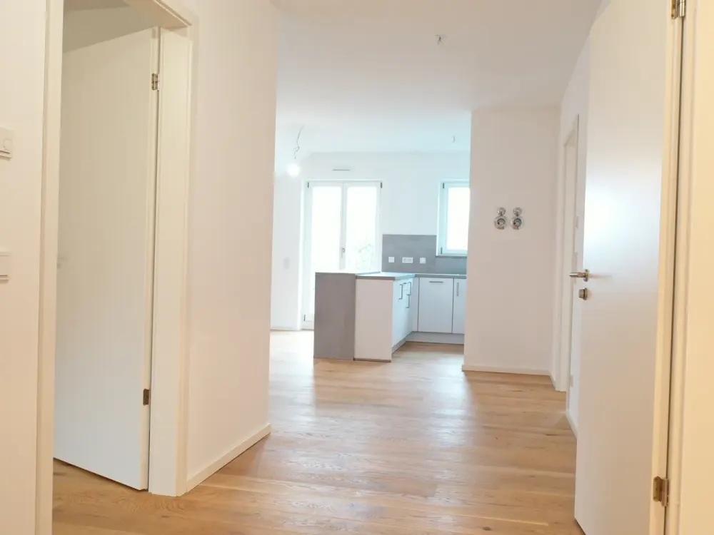 Modernes Wohnen am Pfanzeltplatz, Exklusive 3-Zimmer-Neubauwohnung mit Terrasse und Balkon