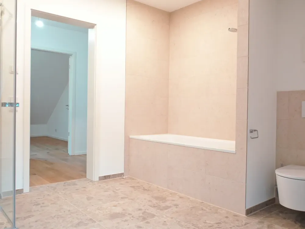 Modernes Wohnen am Pfanzeltplatz, Exklusive 3-Zimmer-Neubauwohnung mit Terrasse und Balkon