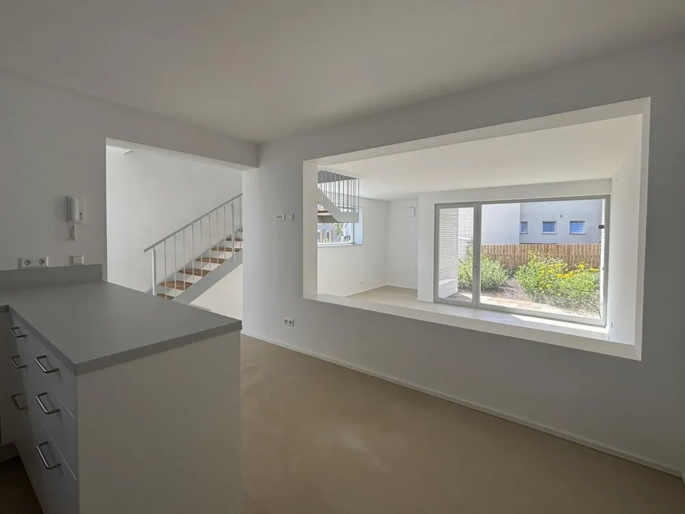 Stilvolle Maisonettewohnung mit Garten, Balkon und Einbauküche