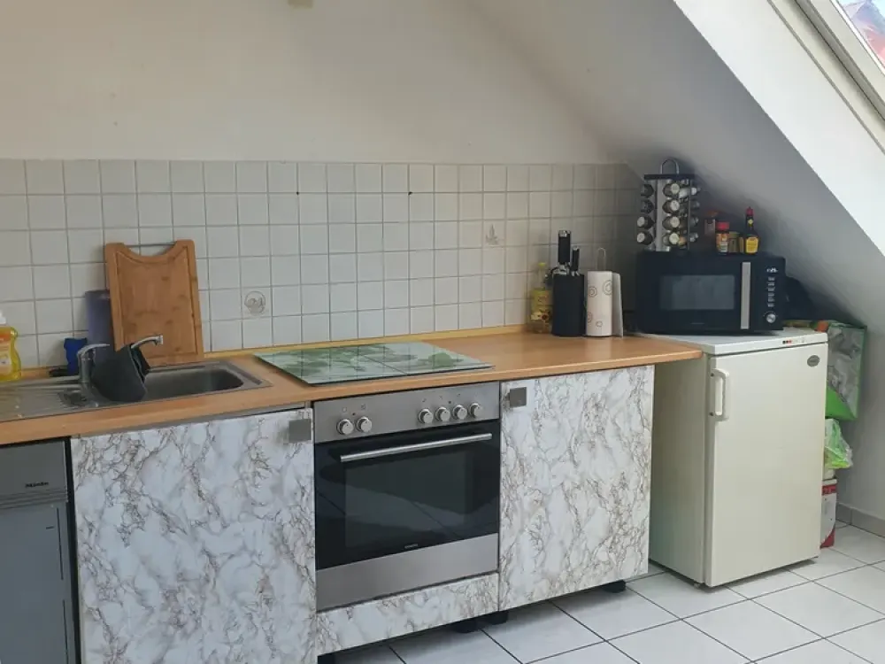 Schöne Dachgeschosswohnung in einem gepflegten Mehrfamilienhaus