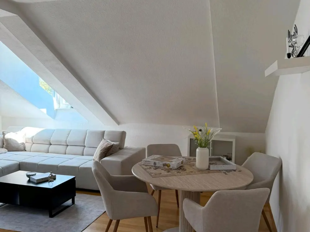 Charming Top-Floor Apartment with 2 Rooms in Göttelborn