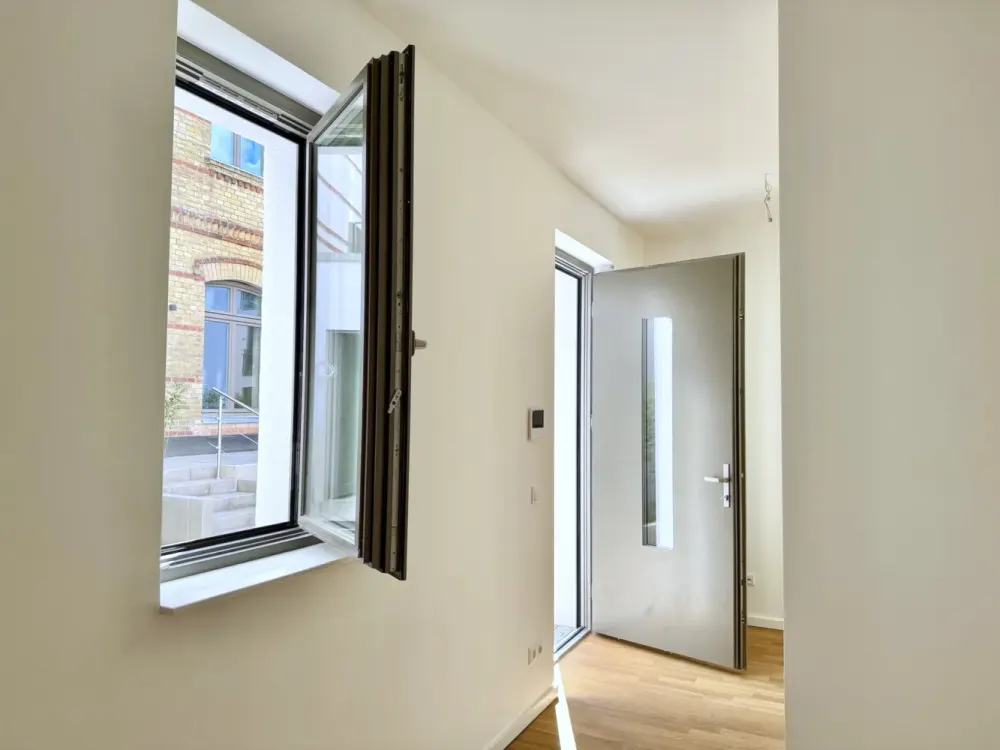 Erstbezug: Wohnung mit Südterrasse im Innenhof