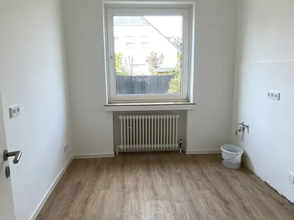 TOP renovated & bright 2-room apartment with large south balcony