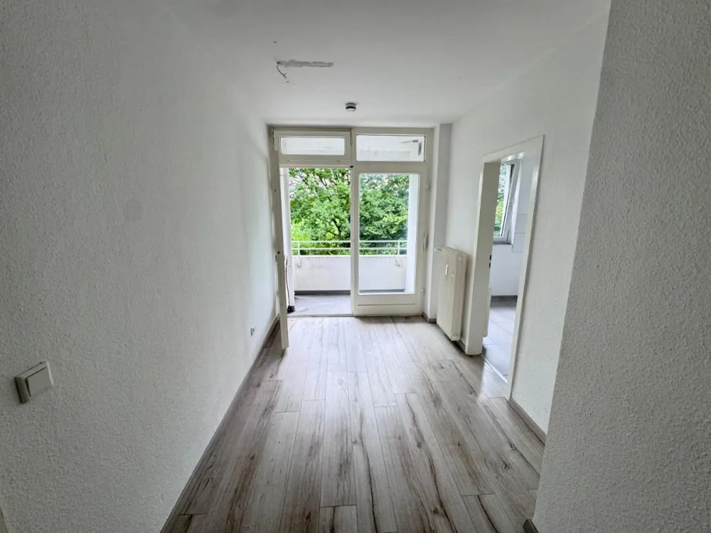 Gemütliche Wohlfühlwohnung im 1. Obergeschoss mit Sonnenbalkon