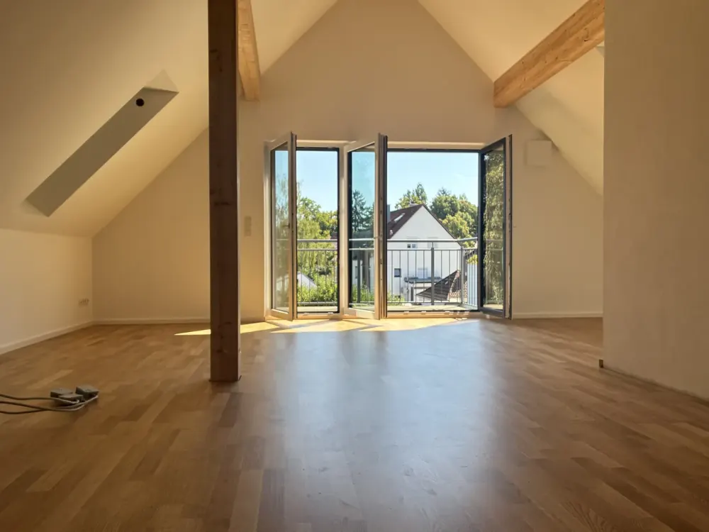 Neubau Dachgeschosswohnung in München Ramersdorf mit Loftcharakter und Blick ins Grüne