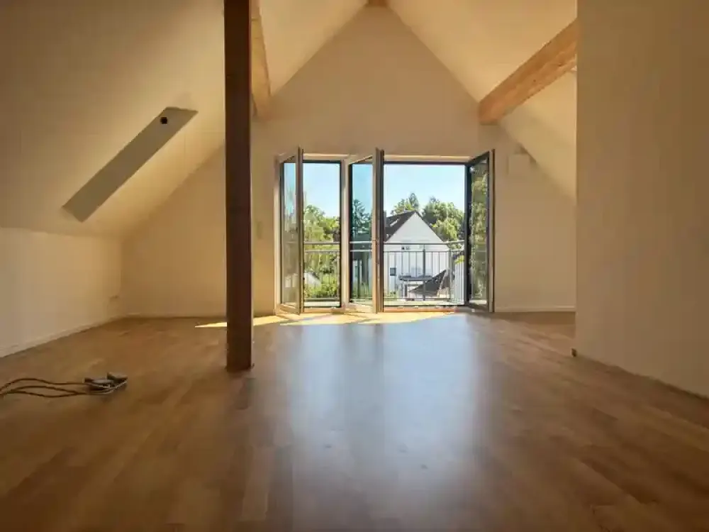 Neubau Dachgeschosswohnung in München Ramersdorf mit Loftcharakter und Blick ins Grüne