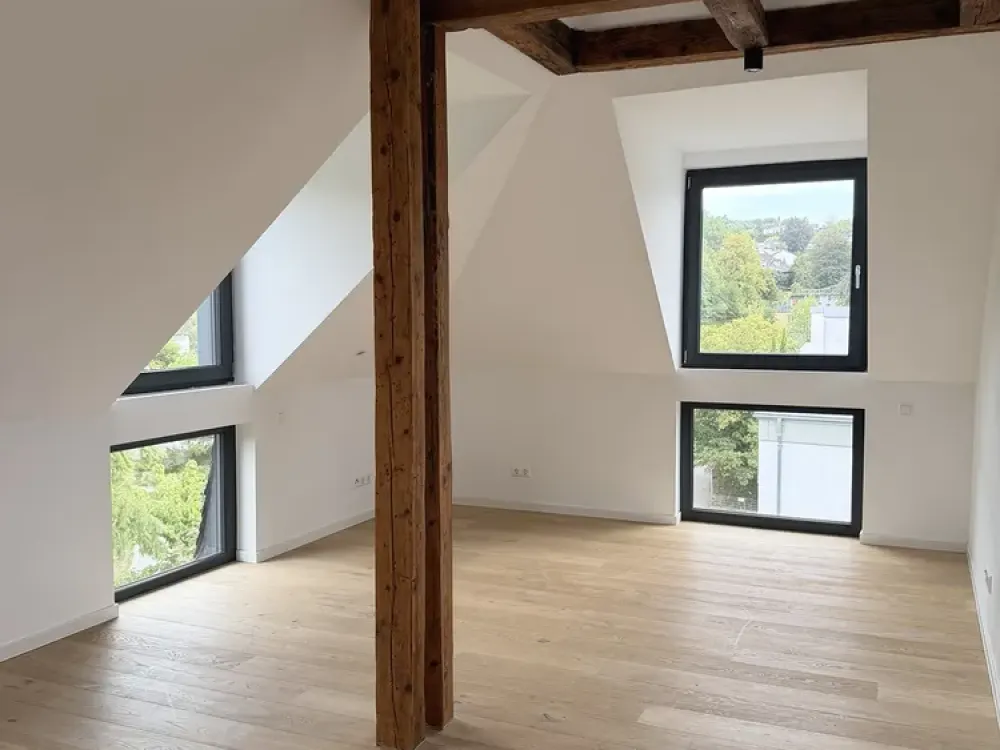Exklusive Dachgeschosswohnung mit Dachterrasse und Blick auf Schlossgarten und Turmberg