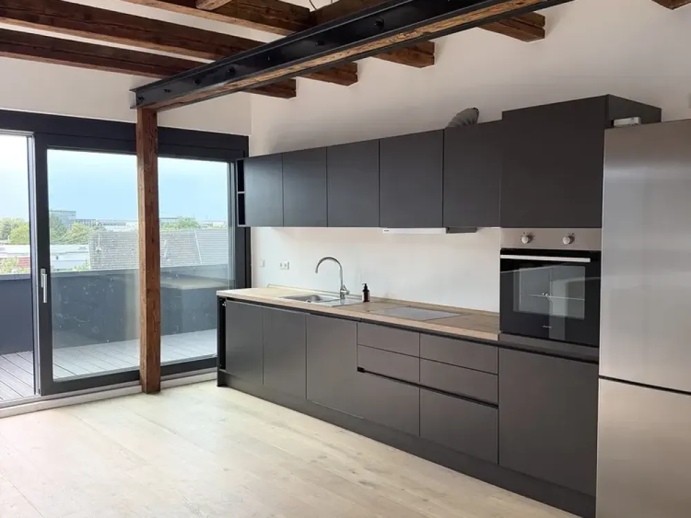 Exklusive Dachgeschosswohnung mit Dachterrasse und Blick auf Schlossgarten und Turmberg