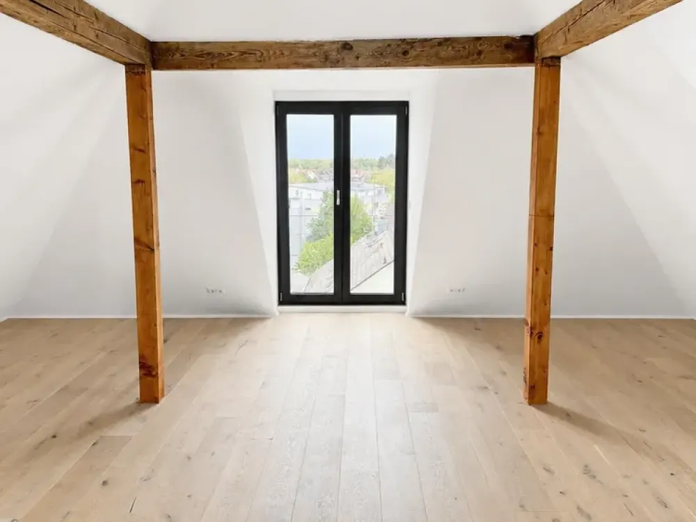 Exklusive Dachgeschosswohnung mit Dachterrasse und Blick auf Schlossgarten und Turmberg
