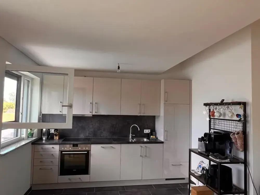 Wohnen mit Charakter: 2-Zimmer-Dachterrassen-Wohnung in München-Perlach