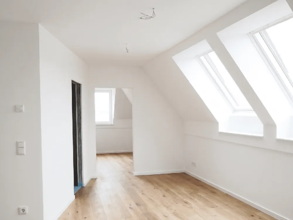 SCHNELL TERMIN MACHEN! Traumhafte 2-Zimmer-DG-Wohnung im Erstbezug + moderner Neubau + Lift + FuBo-Heizung + Parkett + Bäckerei im Haus