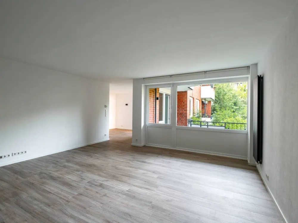 Zentral in Rissen: 3- Zi.-Wohnung im Hochparterre mit Loggia & Tiefgarage | GLADIGAU