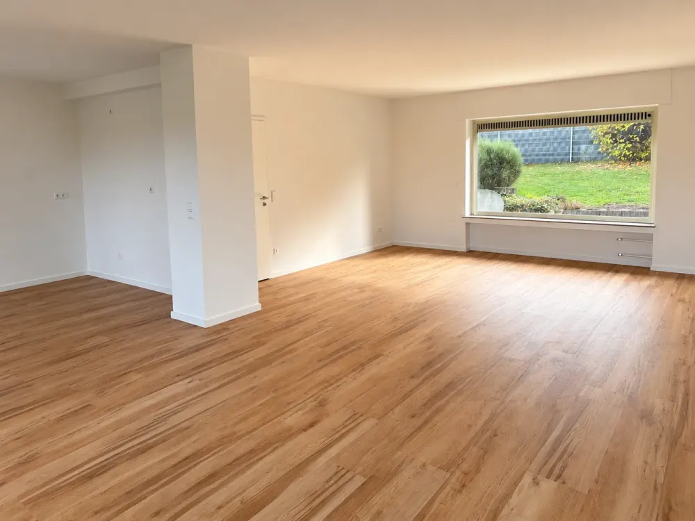 Modern 3.5-Room Ground Floor Apartment with Private South Garden, Rhine Plain View & Garage
