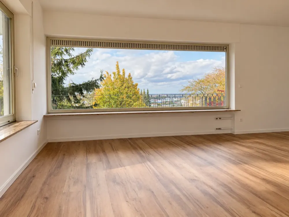 Modern 3.5-Room Ground Floor Apartment with Private South Garden, Rhine Plain View & Garage