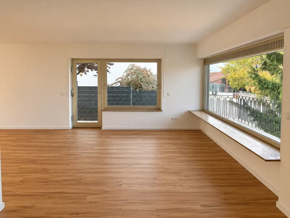 Modern 3.5-Room Ground Floor Apartment with Private South Garden, Rhine Plain View & Garage