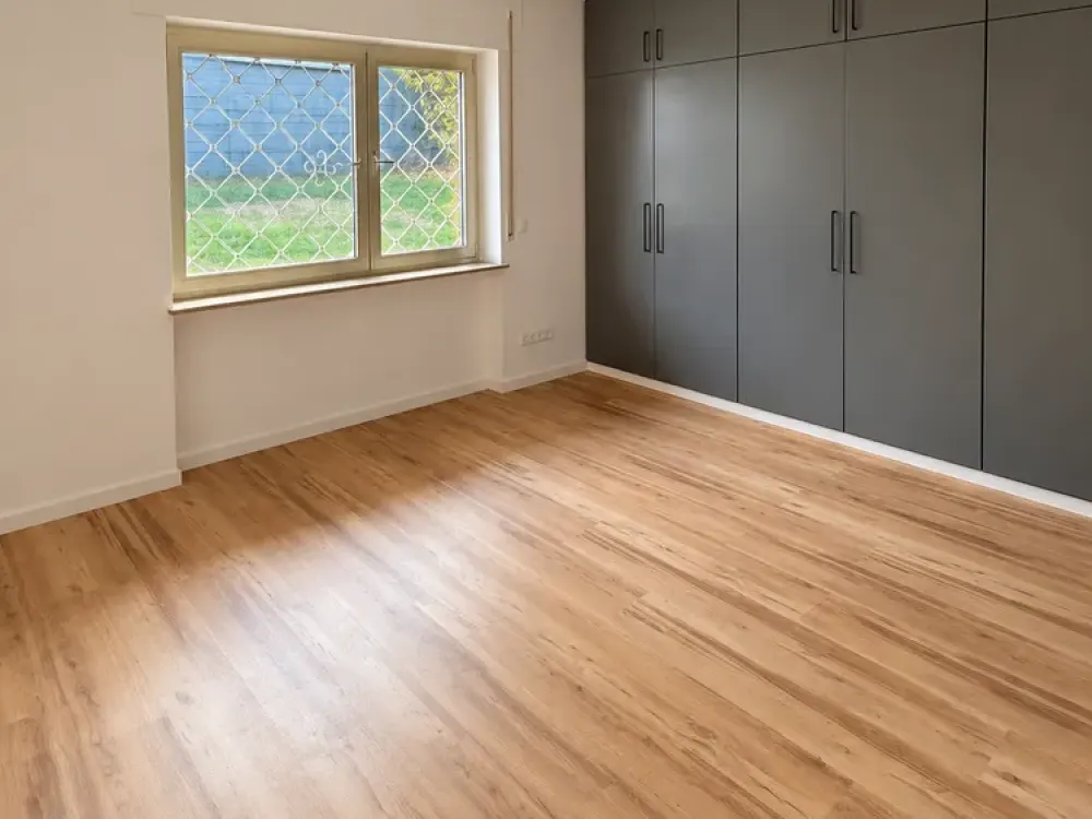 Modern 3.5-Room Ground Floor Apartment with Private South Garden, Rhine Plain View & Garage