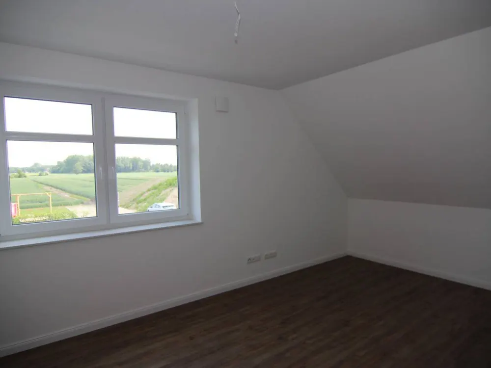 Am Elbdeich gelegene, helle 4-Zimmer-Dachgeschoss-Wohnung über 2 Ebenen mit Balkon