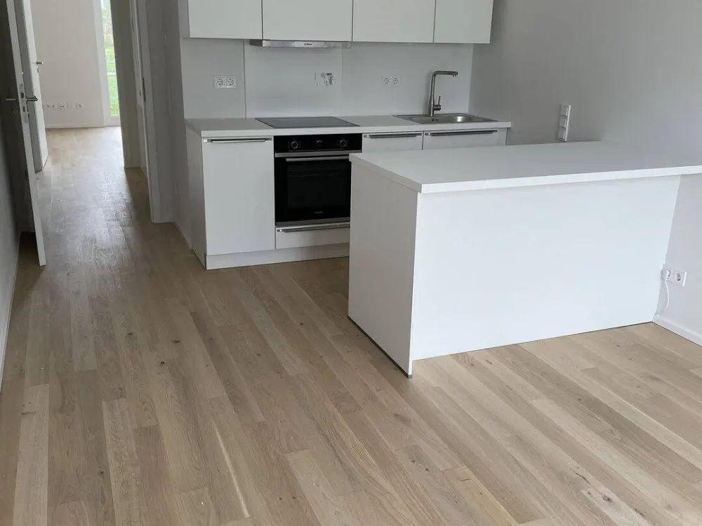 Neubau: Exklusive Top geschnittene 2-Zimmer Terrassenwohnung mit Blick ins Grüne & EBK in Top Lage