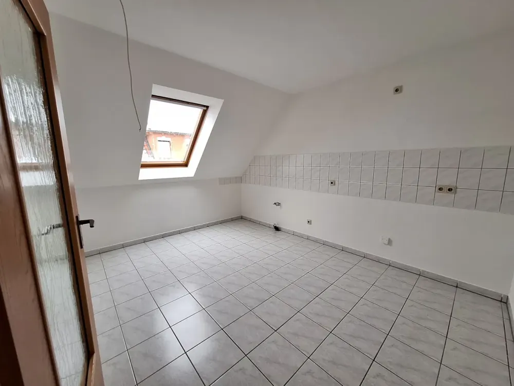 Available Immediately! 2-Room Attic Apartment in Well-Maintained Multi-Family House