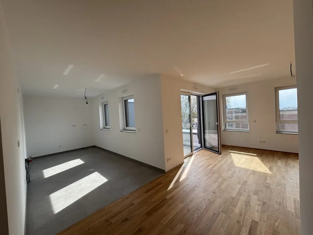 Exklusive Dachgeschosswohnung - Erstbezug mit 3-Zimmern, Süd-Balkon und Mieterstrom-PV