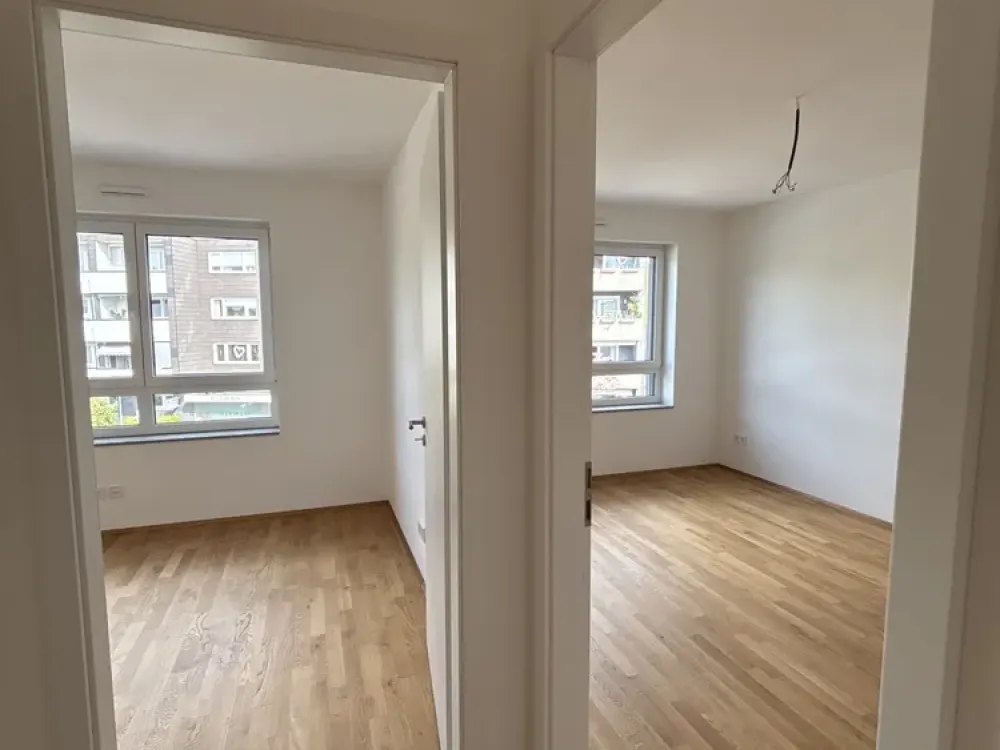 Exklusive Dachgeschosswohnung - Erstbezug mit 3-Zimmern, Süd-Balkon und Mieterstrom-PV