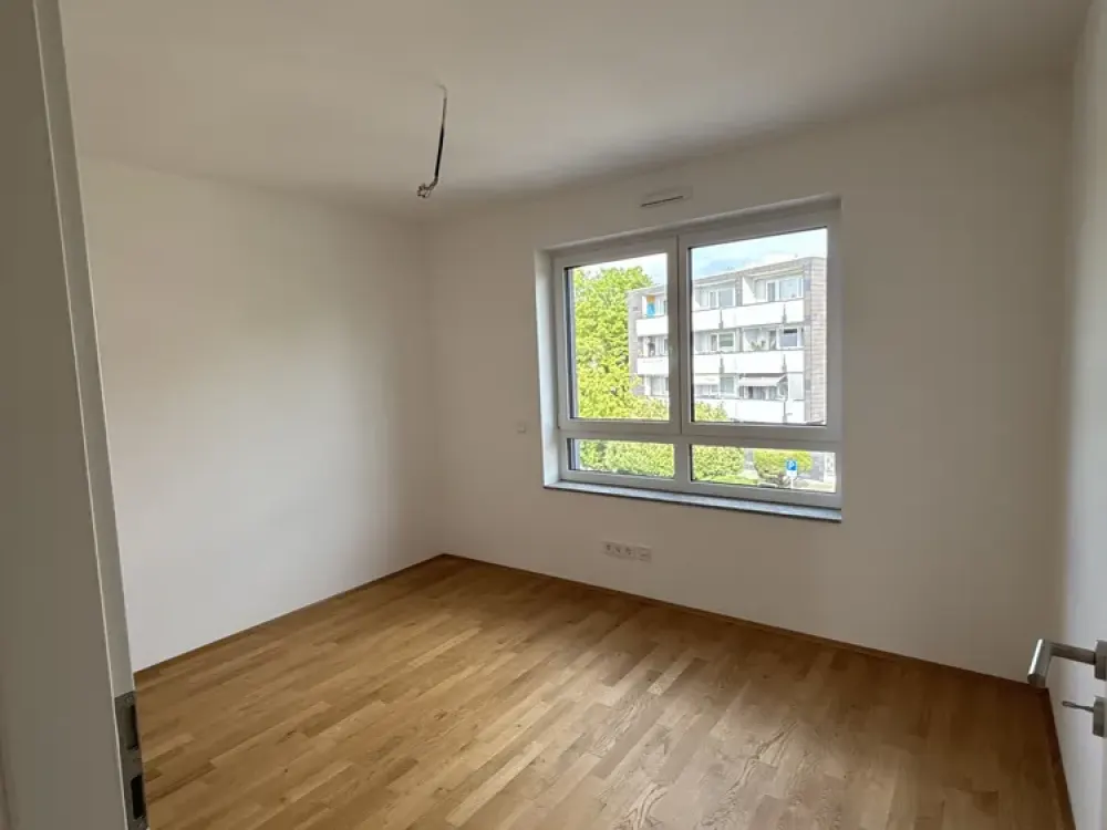 Exklusive Dachgeschosswohnung - Erstbezug mit 3-Zimmern, Süd-Balkon und Mieterstrom-PV