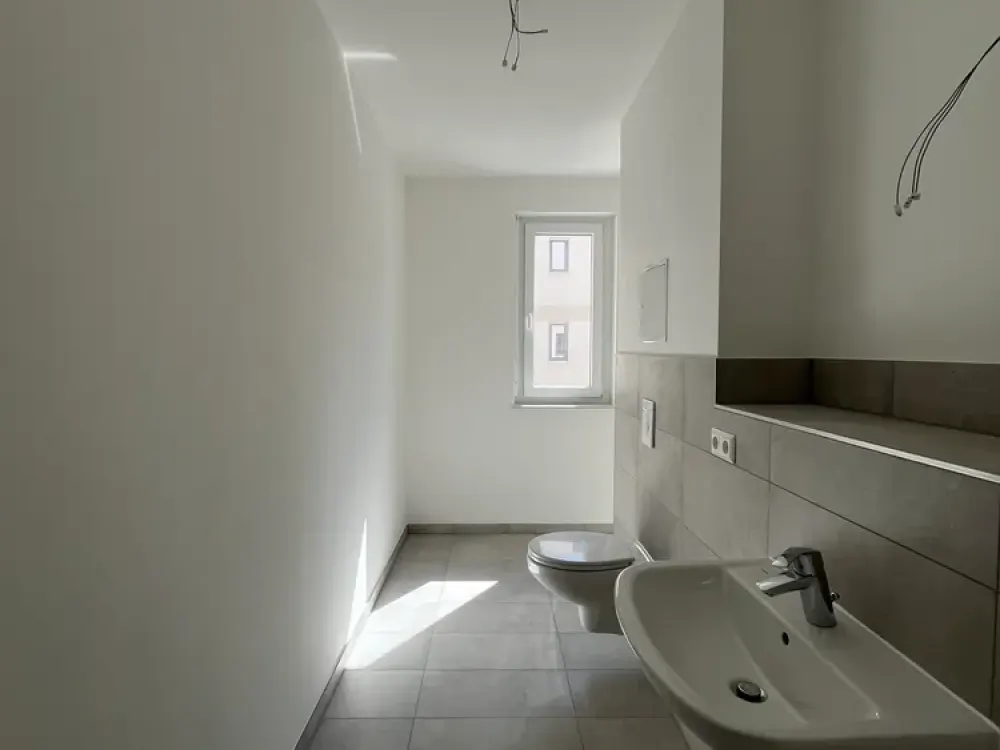 Familienfreundliche 4-Raumwohnung mit Komfortdetails: Aufzug, Gäste-WC, Fußbodenheizung (WE21)