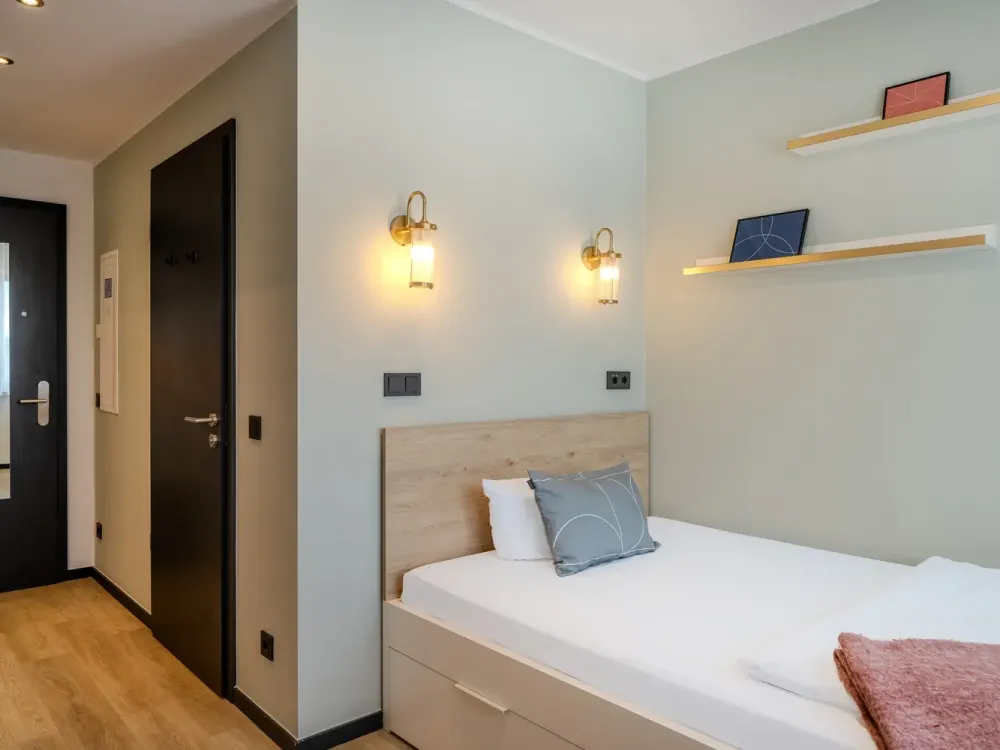 Möblierte Apartments, Community Flächen, Co-Working und Gym