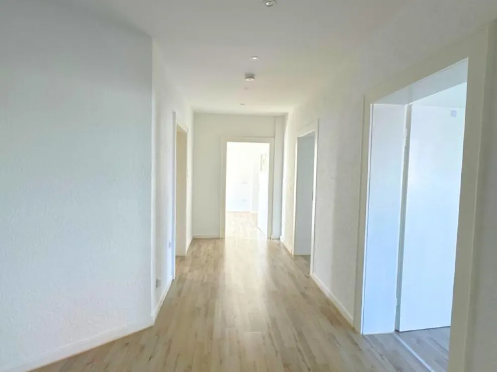 Bright Renovated 4-Room Apartment with Balcony in Convenient Location