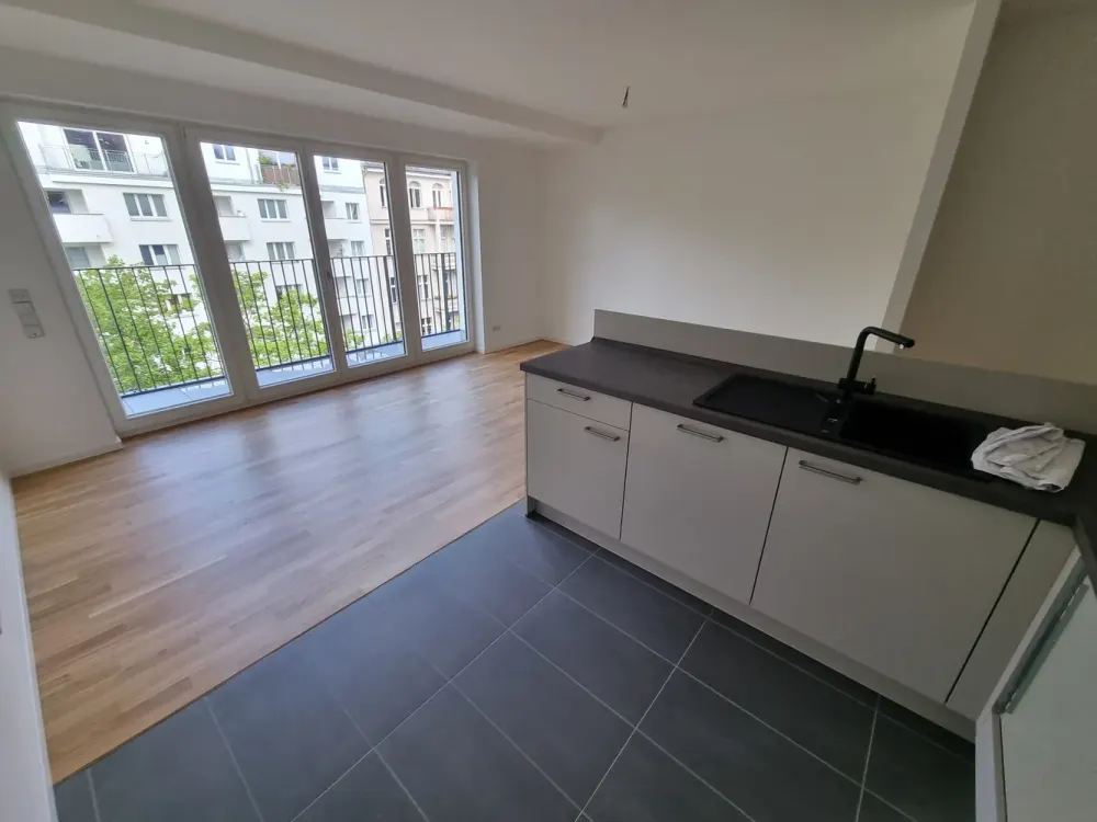 Sonnige 2-Zimmerwohnung mit EBK und Fußbodenheizung sowie einem kleinen Balkon