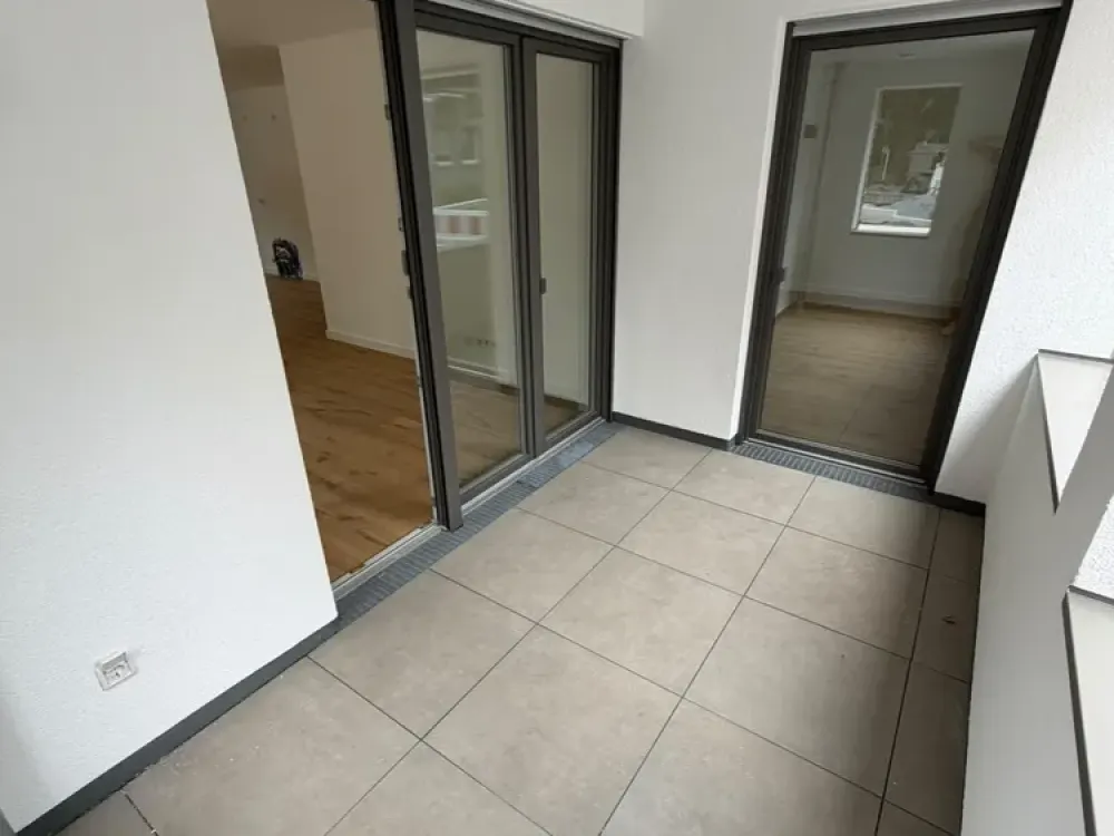 Newly Built 2-Room Apartment with Small Garden in Kreuzviertel