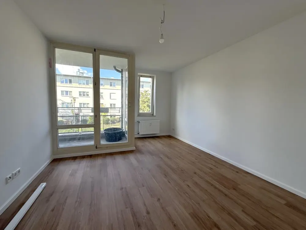 Ihr neues Zuhause mit Balkon und Gartenanteil