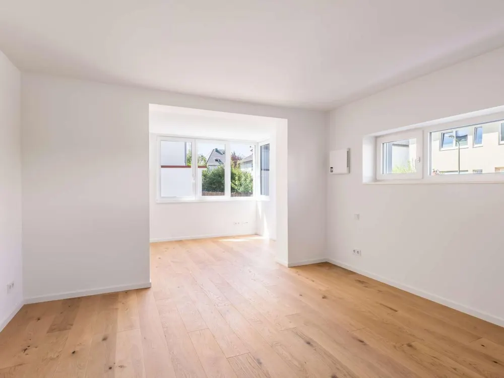 Zum Erstbezug: Großzügige 4-Zimmer-Wohnung im Erdgeschoss mit Privatgarten