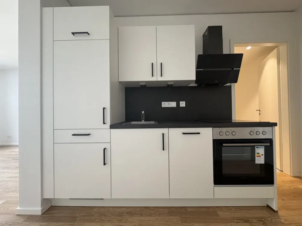 Da kommt man gern Heim. ansprechende 1-Zimmer-Wohnung mit Einbauküche im Erstbezug