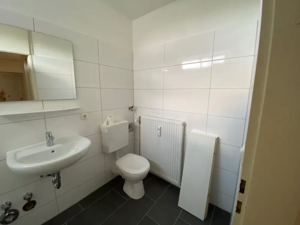 Gepflegte 1-Zimmer-Wohnung in Ottobrunn, Balkon, Einbauküche, Aufzug, TG-Stellplatz